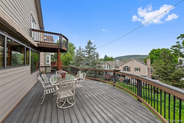 18 Blue Sage, Littleton, CO 80127 - wooden deck with outdoor dining space