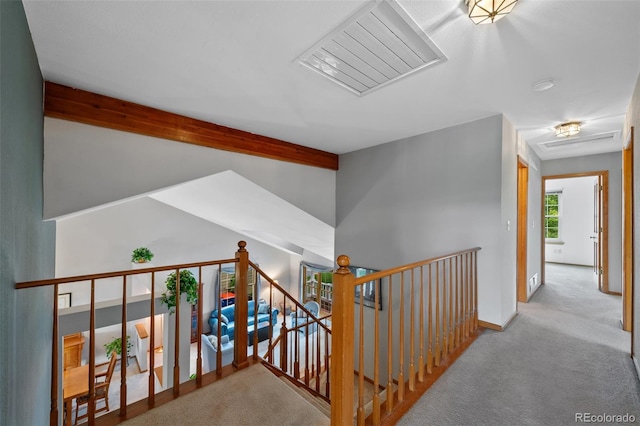 18 Blue Sage, Littleton, CO 80127 - corridor with an upstairs landing, carpet floors, beam ceiling, and attic access