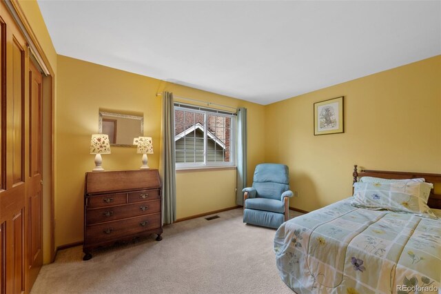 18 Blue Sage, Littleton, CO 80127 - carpeted bedroom featuring baseboards and a closet