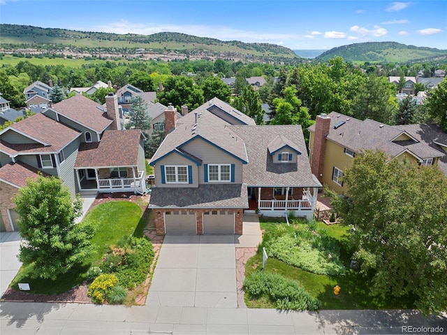 18 Blue Sage, Littleton, CO 80127 - aerial view of residential area with a mountain backdrop