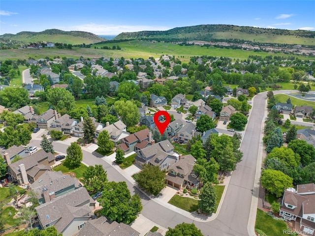 18 Blue Sage, Littleton, CO 80127 - aerial view of residential area with a mountainous background
