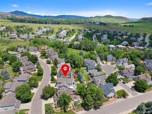 18 Blue Sage, Littleton, CO 80127 - aerial perspective of suburban area with a mountain backdrop