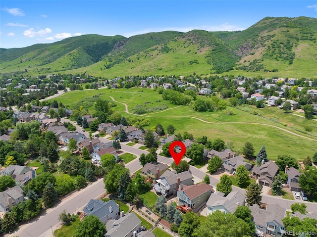 18 Blue Sage, Littleton, CO 80127 - aerial view of residential area with a mountain backdrop