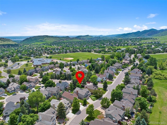 18 Blue Sage, Littleton, CO 80127 - aerial perspective of suburban area with a mountain backdrop
