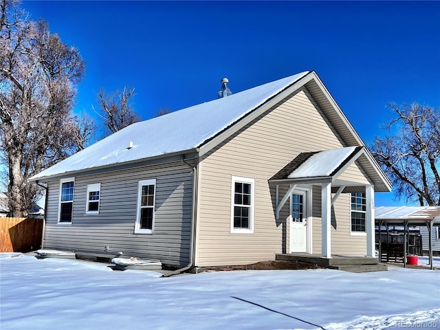 view of snow covered property