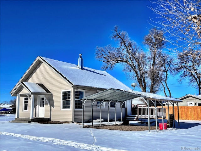 view of front of property with a carport