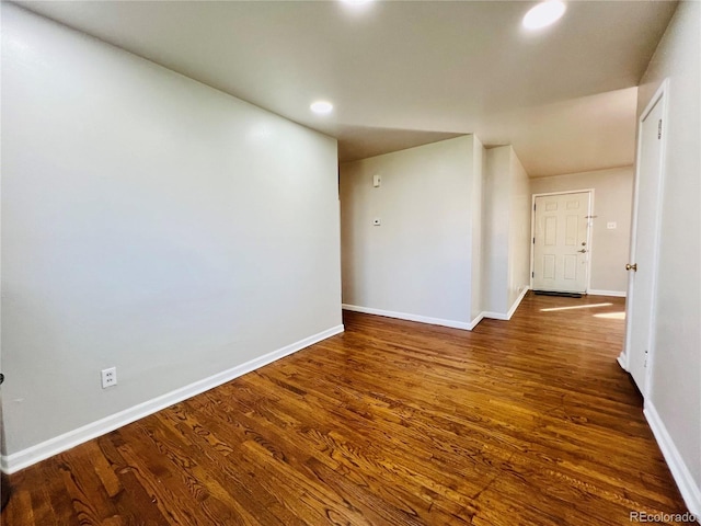 2027 S Newton St, Denver, CO 80219 - spare room featuring baseboards, dark wood-style floors, and recessed lighting