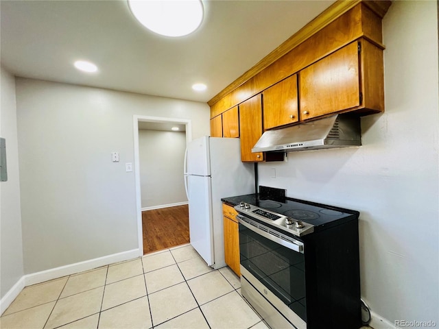 2027 S Newton St, Denver, CO 80219 - kitchen featuring baseboards, under cabinet range hood, brown cabinets, and electric range
