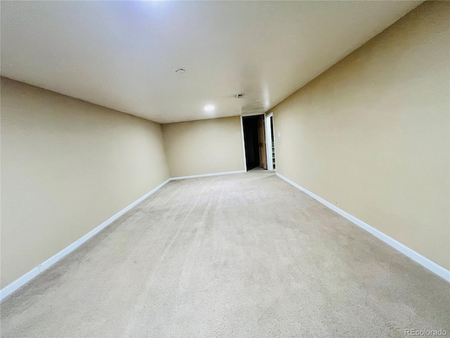 2027 S Newton St, Denver, CO 80219 - empty room with light carpet and baseboards