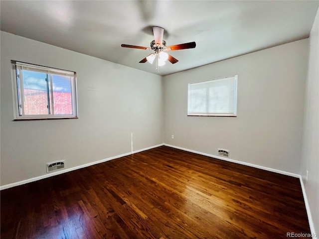 2027 S Newton St, Denver, CO 80219 - spare room featuring visible vents, baseboards, and plenty of natural light