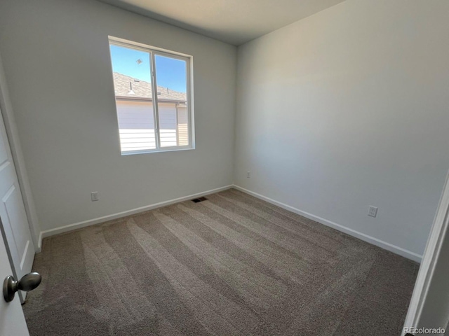 6648 N Nepal Ct, Aurora, CO 80019 - carpeted empty room featuring baseboards