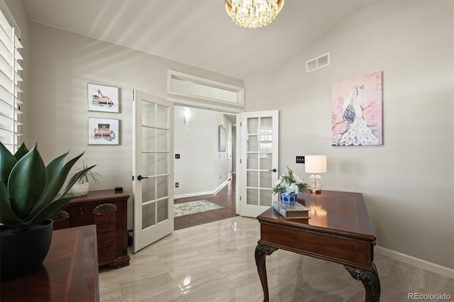 interior space with visible vents, baseboards, vaulted ceiling, french doors, and an inviting chandelier