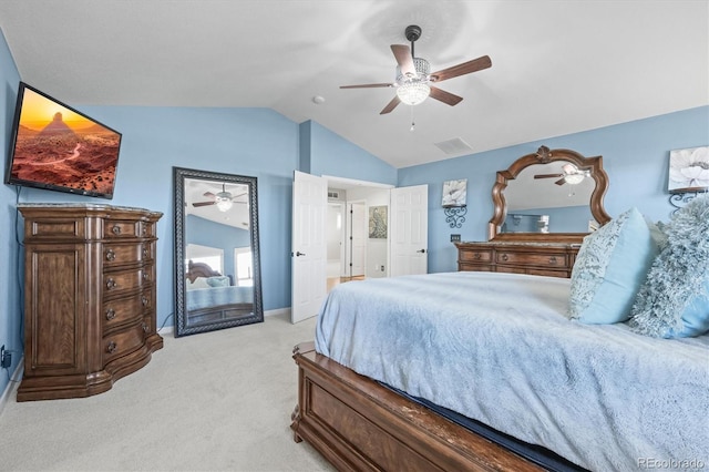 bedroom featuring a ceiling fan, light colored carpet, visible vents, and vaulted ceiling