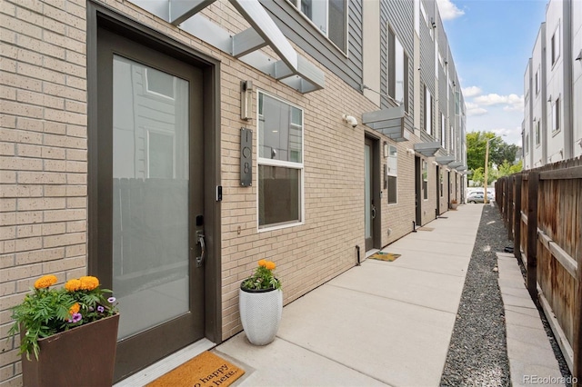 1836 Grove St Unit 108, Denver, CO 80204 - property entrance with brick siding