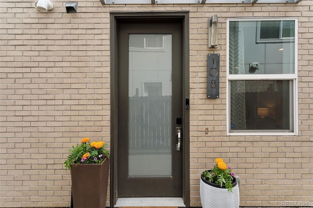 1836 Grove St Unit 108, Denver, CO 80204 - doorway to property with brick siding