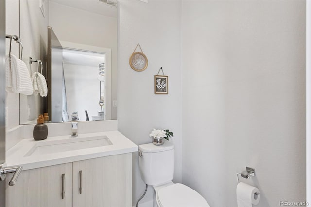 1836 Grove St Unit 108, Denver, CO 80204 - bathroom with toilet and vanity