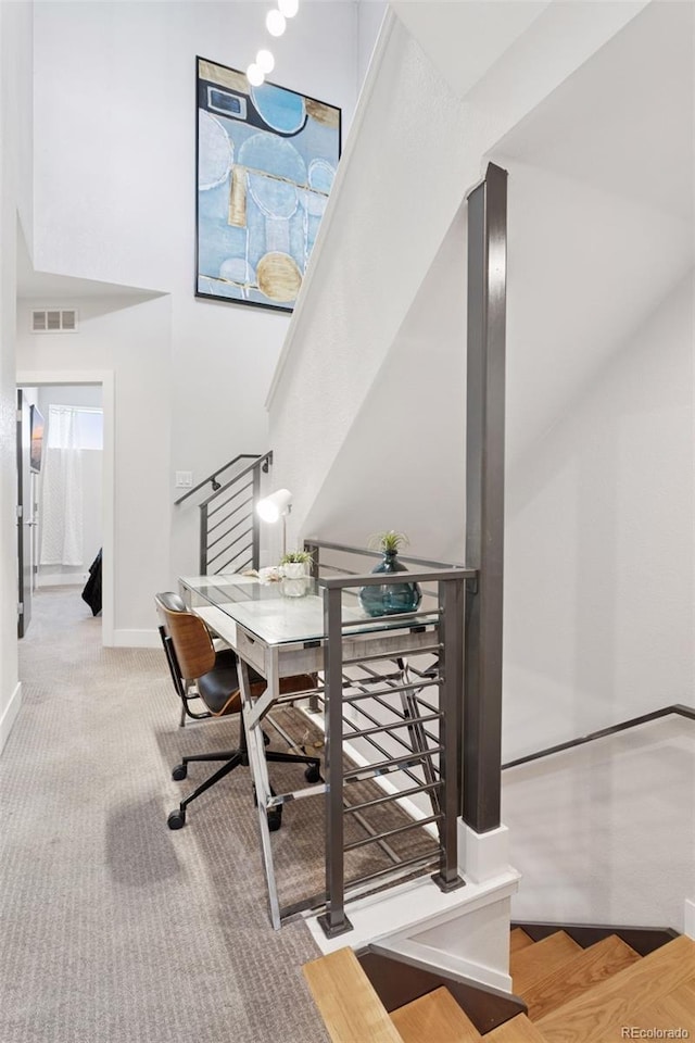 1836 Grove St Unit 108, Denver, CO 80204 - carpeted office space with baseboards and a high ceiling