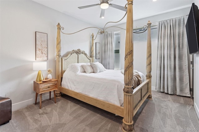 1836 Grove St Unit 108, Denver, CO 80204 - bedroom with carpet floors, baseboards, and ceiling fan