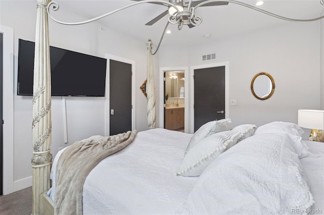1836 Grove St Unit 108, Denver, CO 80204 - carpeted bedroom with ensuite bath, a ceiling fan, and recessed lighting