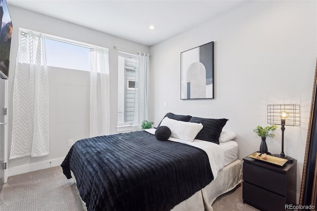 1836 Grove St Unit 108, Denver, CO 80204 - bedroom with carpet floors, baseboards, and recessed lighting