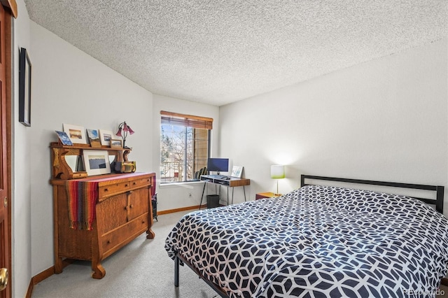 carpeted bedroom with a textured ceiling