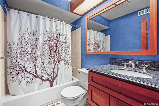 full bathroom with vanity, toilet, and shower / tub combo