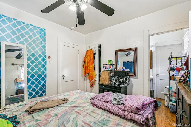 1850 S Williams St, Denver, CO 80210 - bedroom featuring wood finished floors and a ceiling fan