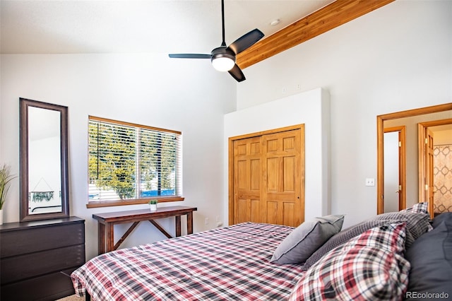 bedroom featuring a towering ceiling and a closet