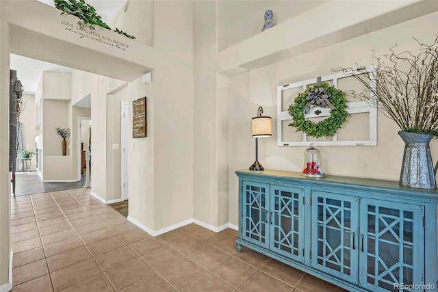 16048 Butterwort Cir, Parker, CO 80134 - corridor with baseboards and tile patterned flooring
