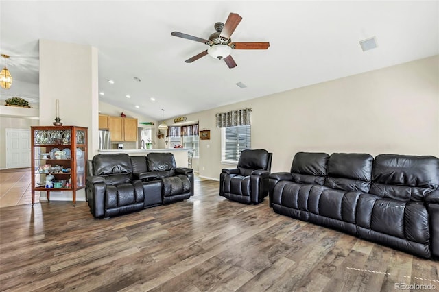 16048 Butterwort Cir, Parker, CO 80134 - living room featuring vaulted ceiling, wood finished floors, recessed lighting, and ceiling fan