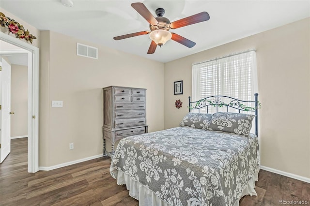 16048 Butterwort Cir, Parker, CO 80134 - bedroom with baseboards, wood finished floors, visible vents, and ceiling fan