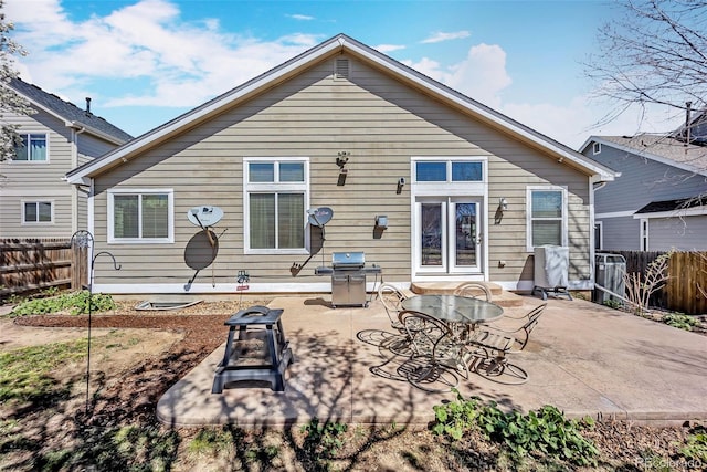 16048 Butterwort Cir, Parker, CO 80134 - back of house with a patio and fence