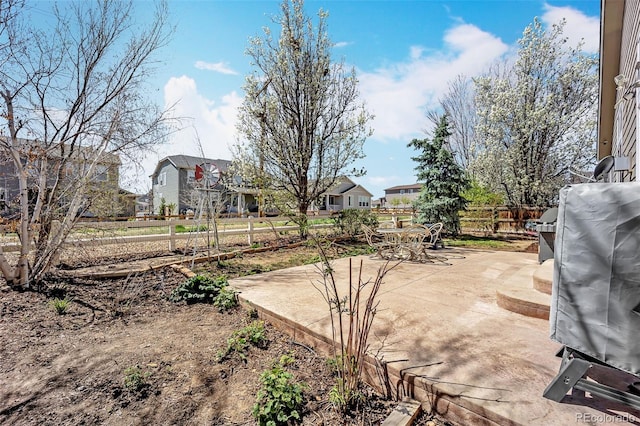 16048 Butterwort Cir, Parker, CO 80134 - view of yard with a residential view, a patio area, and a fenced backyard