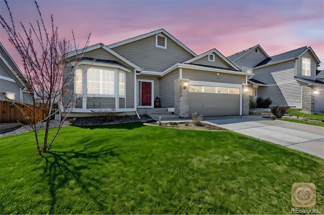 16048 Butterwort Cir, Parker, CO 80134 - view of front of home featuring concrete driveway, an attached garage, fence, and a lawn