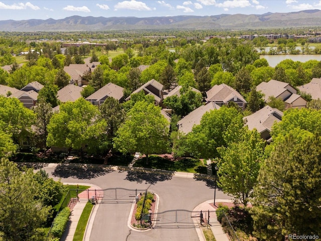 6900 W Grant Ranch Blvd Unit 49, Littleton, CO 80123 - aerial view of residential area featuring a water and mountain view
