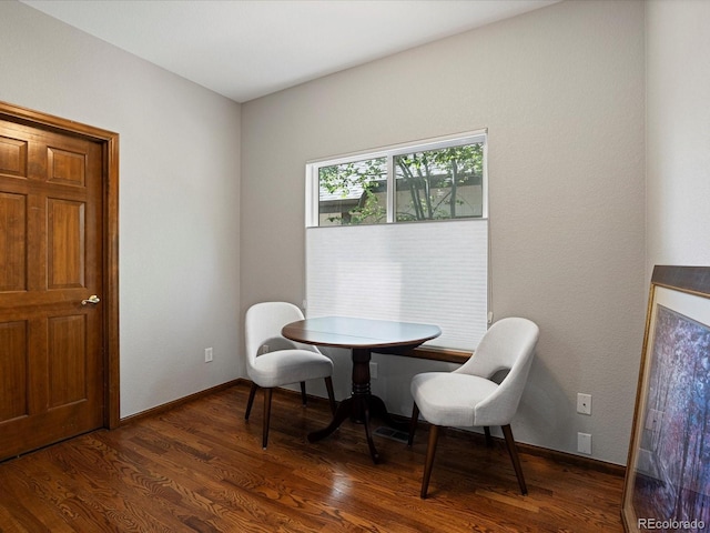 6900 W Grant Ranch Blvd Unit 49, Littleton, CO 80123 - dining room featuring dark wood-style flooring and baseboards