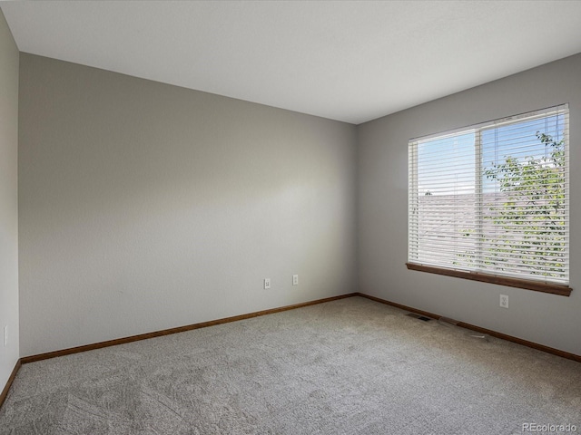 6900 W Grant Ranch Blvd Unit 49, Littleton, CO 80123 - carpeted empty room with baseboards