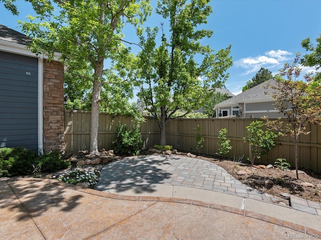 6900 W Grant Ranch Blvd Unit 49, Littleton, CO 80123 - fenced backyard with a patio