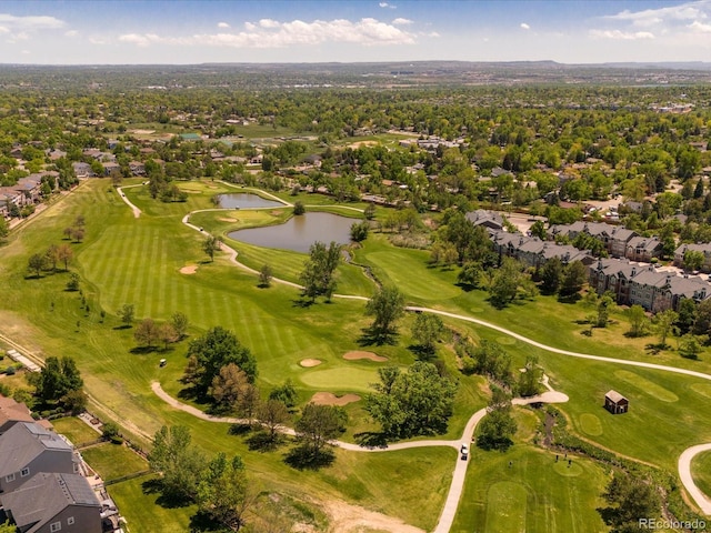 6900 W Grant Ranch Blvd Unit 49, Littleton, CO 80123 - aerial view of property's location featuring a large body of water, nearby suburban area, and a local golf course