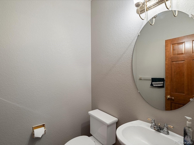6900 W Grant Ranch Blvd Unit 49, Littleton, CO 80123 - half bath featuring toilet and a sink