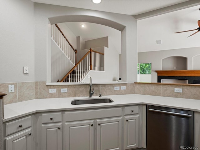 6900 W Grant Ranch Blvd Unit 49, Littleton, CO 80123 - kitchen with dishwasher, a sink, ceiling fan, light countertops, and vaulted ceiling