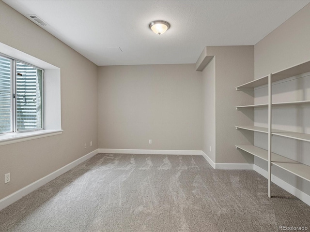 6900 W Grant Ranch Blvd Unit 49, Littleton, CO 80123 - carpeted empty room featuring baseboards