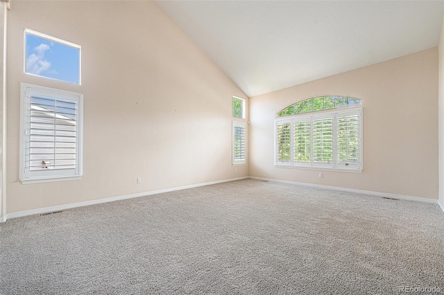 10155 Charissglen Ln, Littleton, CO 80126 - carpeted empty room featuring high vaulted ceiling and baseboards