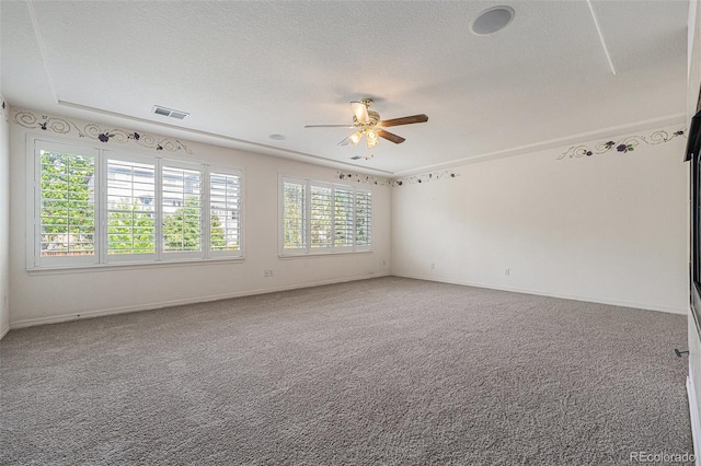 10155 Charissglen Ln, Littleton, CO 80126 - empty room featuring ceiling fan, carpet floors, a textured ceiling, and baseboards