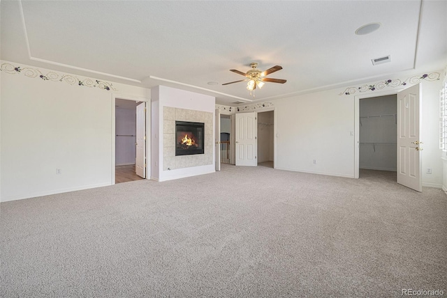 10155 Charissglen Ln, Littleton, CO 80126 - unfurnished bedroom with multiple closets, baseboards, and carpet