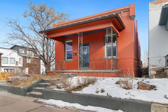 view of front facade featuring covered porch