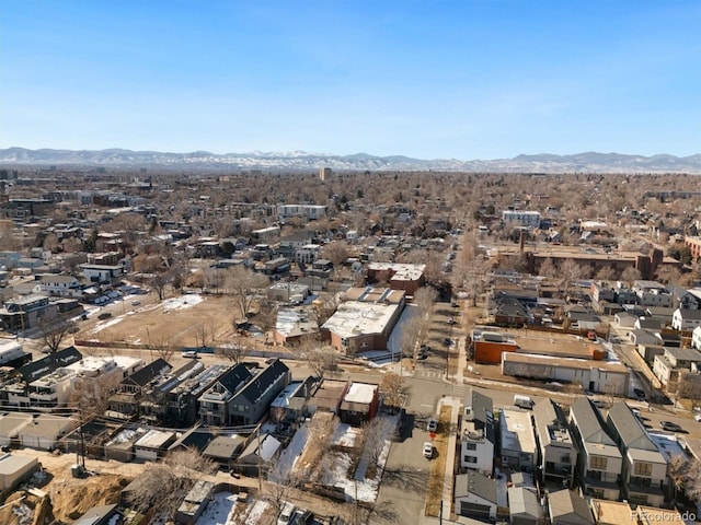 birds eye view of property featuring a mountain view