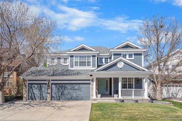 view of front of house featuring a garage, a front lawn, covered porch, a shingled roof, and concrete driveway