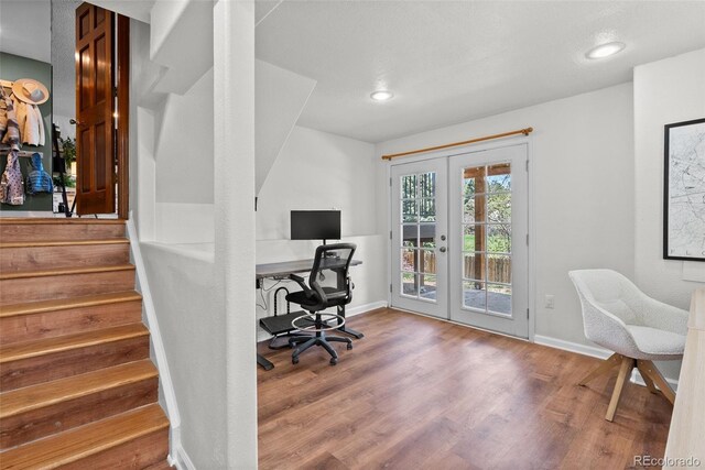 office area featuring french doors, recessed lighting, baseboards, and wood finished floors