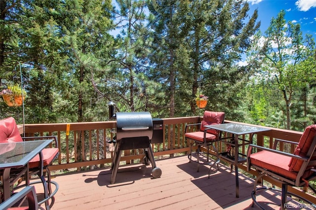 wooden deck with area for grilling